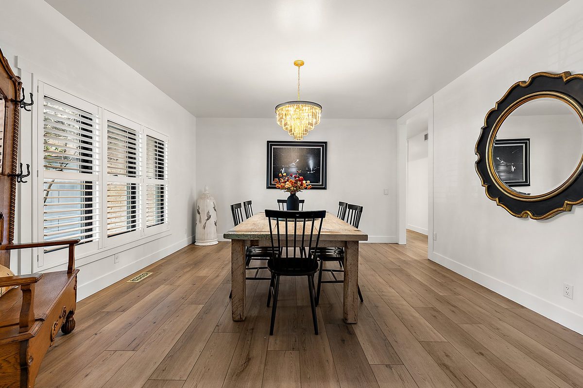 Clean dining room with finished floors and bright wall surfaces.