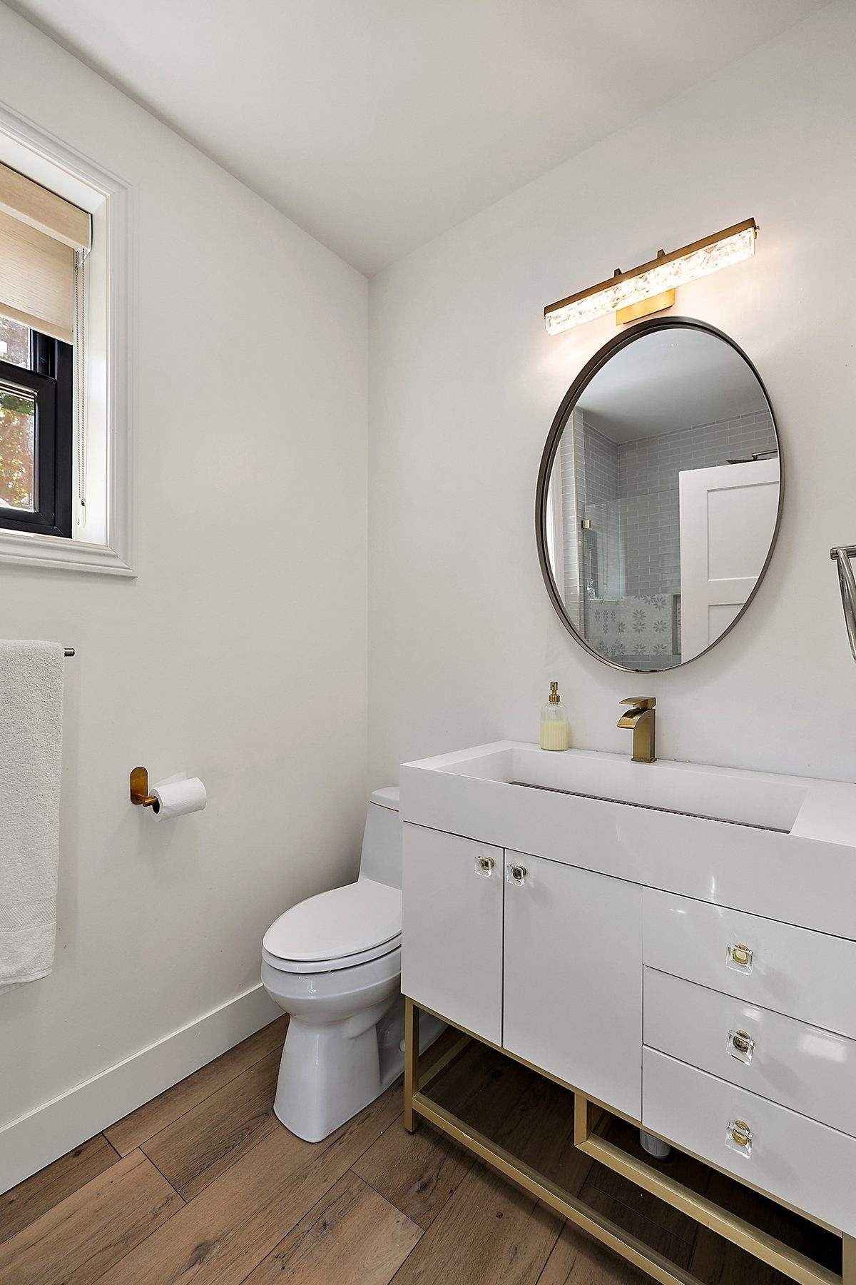 Clean small bathroom refreshed for a property walkthrough.