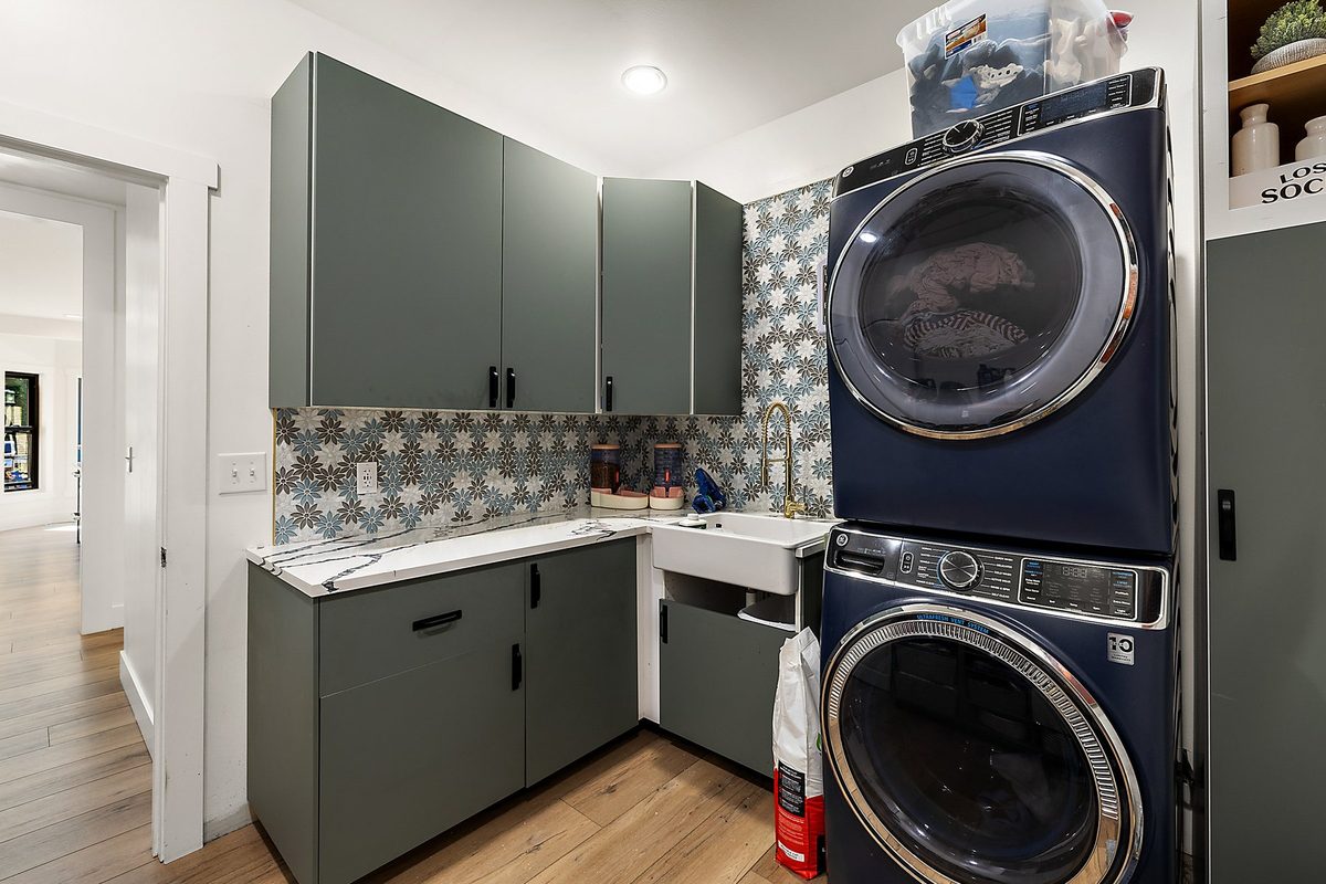 Utility area with refreshed fixtures and clean tile detail.